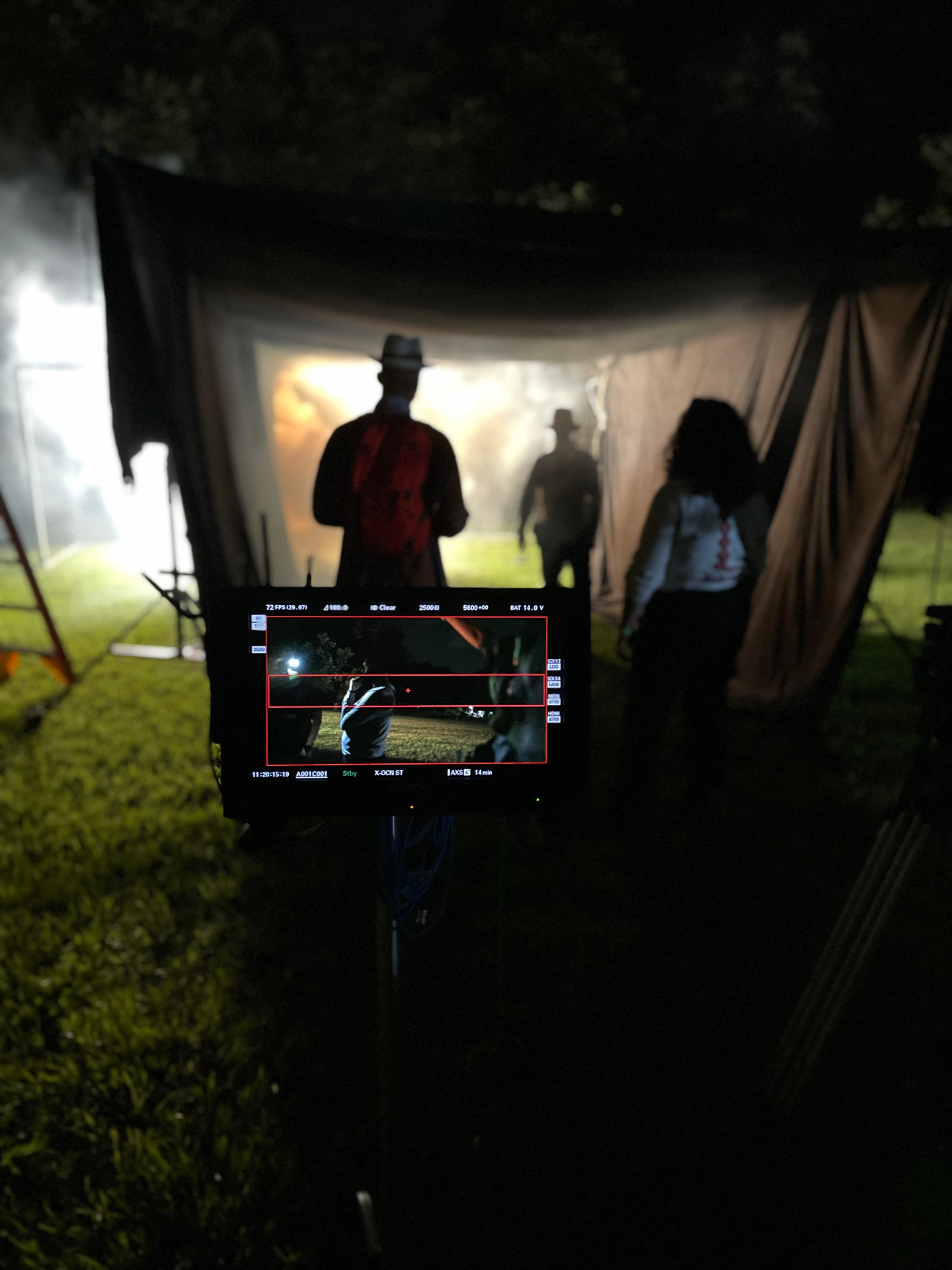 Director's monitor framing a night exterior shot on location